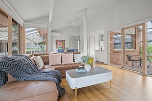 Comfort House, Garden View | Living area | 55-inch TV with cable channels, Netflix, streaming services
