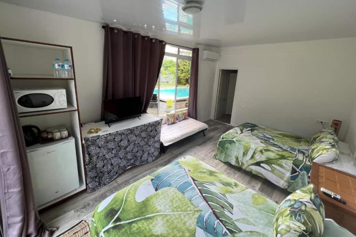 Classic Quadruple Room, Pool View, Garden Area