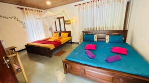 Family Room | Individually furnished, desk, laptop workspace, free WiFi - Surf Paradise Hotel  (Tangalle)