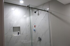 Shower, towels, soap, shampoo