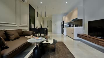Executive Apartment | Living room | 55-inch Smart TV with digital channels