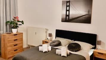 1 dormitorio, tabla de planchar con plancha, wifi gratis y ropa de cama