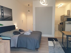 1 habitación, tabla de planchar con plancha, wifi gratis y ropa de cama 