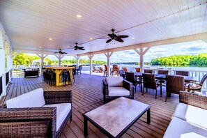 Outdoor dining - 7BR Private Paradise 2 Story Dock, Beach, Hot Tub (Mineral)