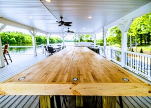 Outdoor dining - 7BR Private Paradise 2 Story Dock, Beach, Hot Tub (Mineral)