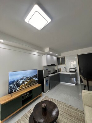 Business Apartment | Private kitchen | Fridge, microwave, cookware/dishes/utensils - Lux Suites Gold Park Apartments Kilimani (Nairobi)