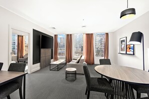 Executive Two Bedroom Apartment | Living area | 65-inch LED TV with cable channels - Melbourne City Suites (Melbourne)