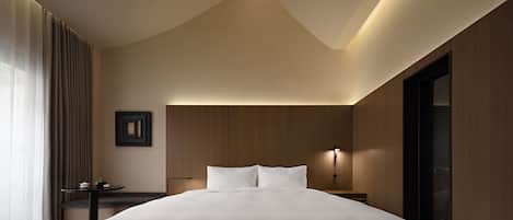 Habitación exclusiva, 1 cama King size, vista al patio | Edredón, artículos del minibar gratis y wifi gratis