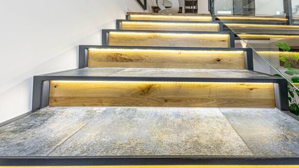 A staircase with wooden steps and a modern design.