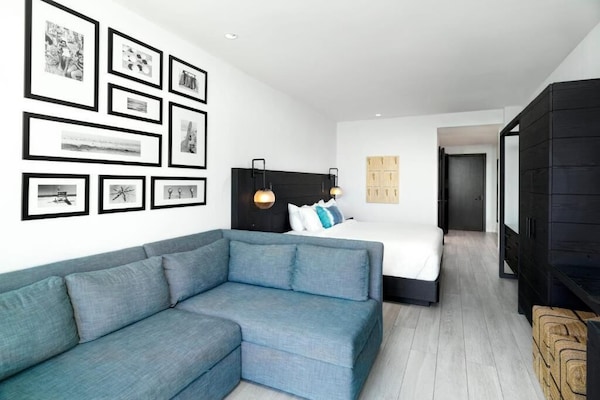 Unwind on the plush sofa after a sun-soaked day.