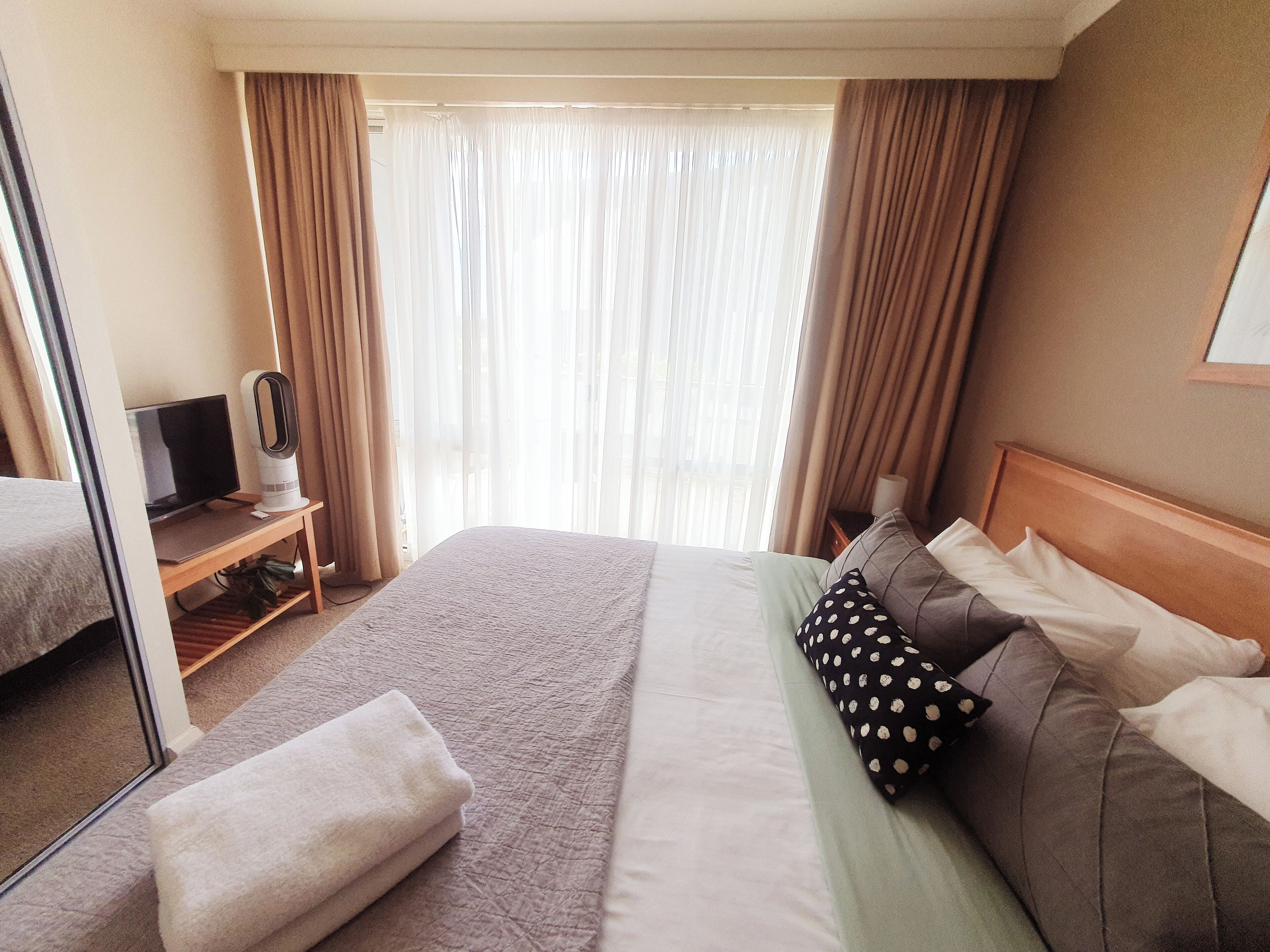 Central City Apartment, Pool, Sauna, Parking Available | Memory-foam beds, free minibar, blackout curtains, soundproofing