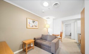 Central City Apartment, Pool, Sauna, Parking Available | Living area | 32-inch flat-screen TV with digital channels - City Central Canberra Unit (Canberra)