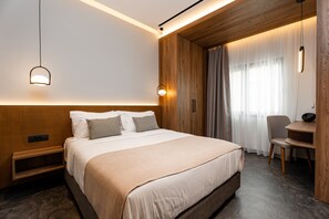 Suite Deluxe | Caja fuerte, cortinas opacas, sistema de insonorización