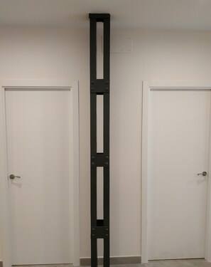 A white door with a black metal handle and a white door with a black metal handle. - Luxury Center (Seville)