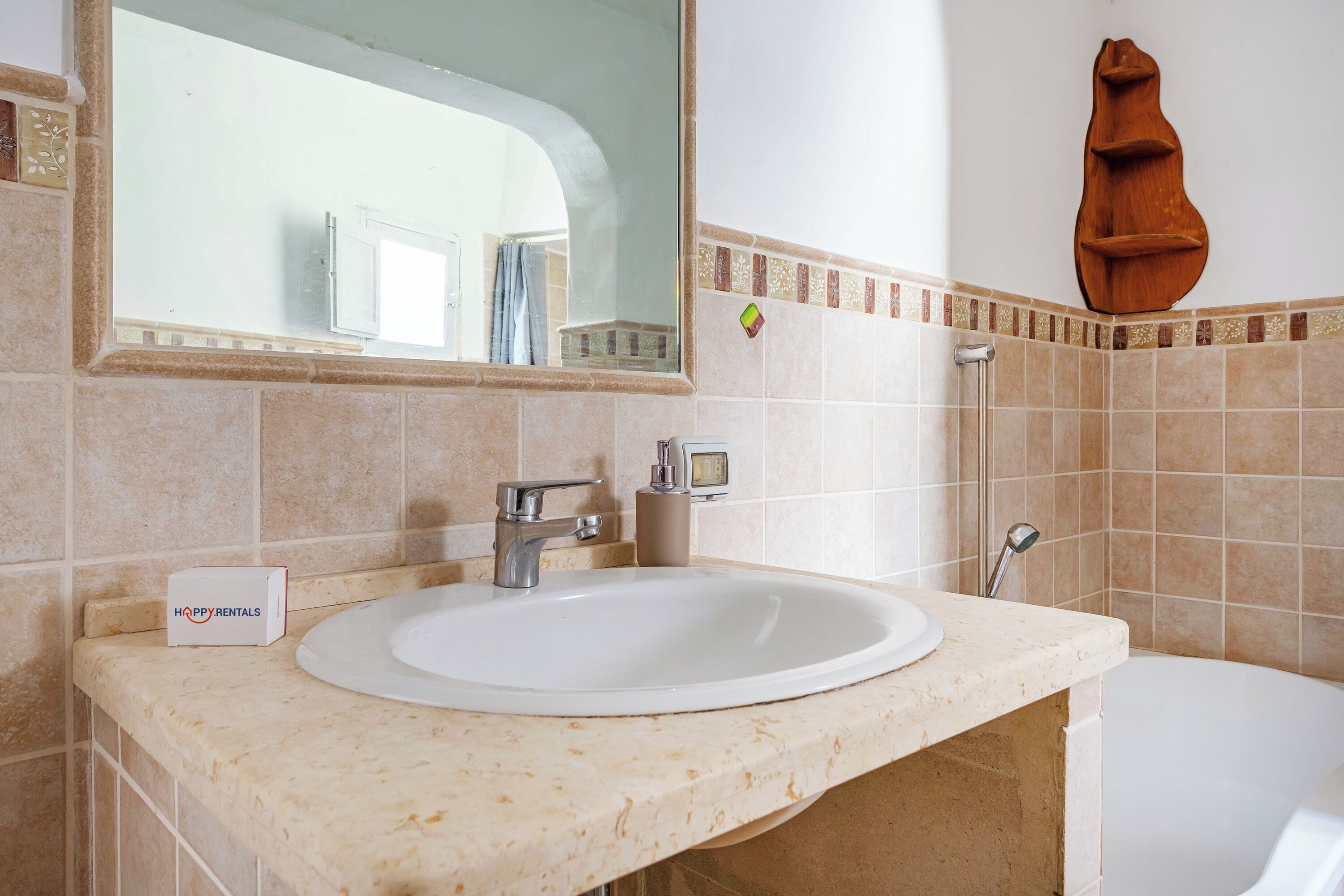 Separate tub and shower, hair dryer, bidet, towels