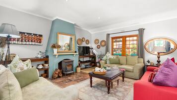 House (5 Bedrooms) | Living area | 42-inch LED TV with satellite channels, fireplace