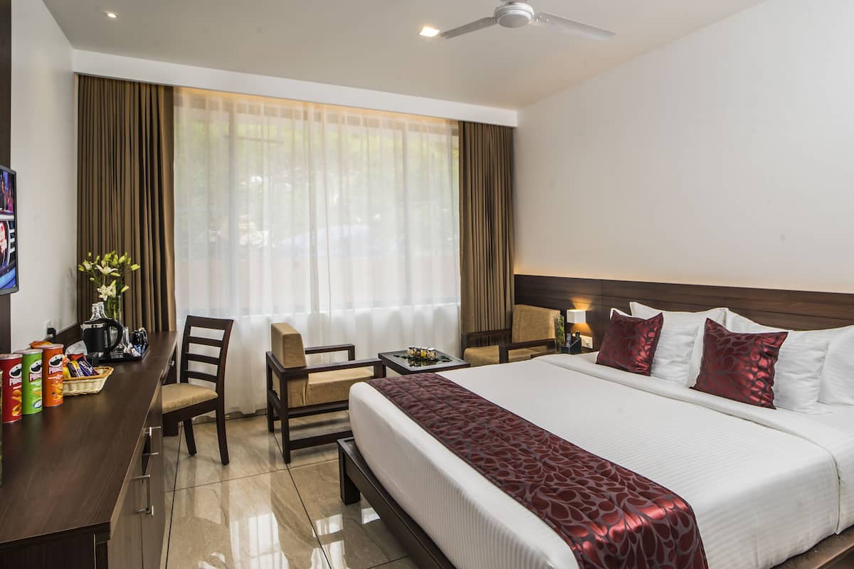 Peralatan tempat tidur premium, bar mini, peti besi dalam bilik