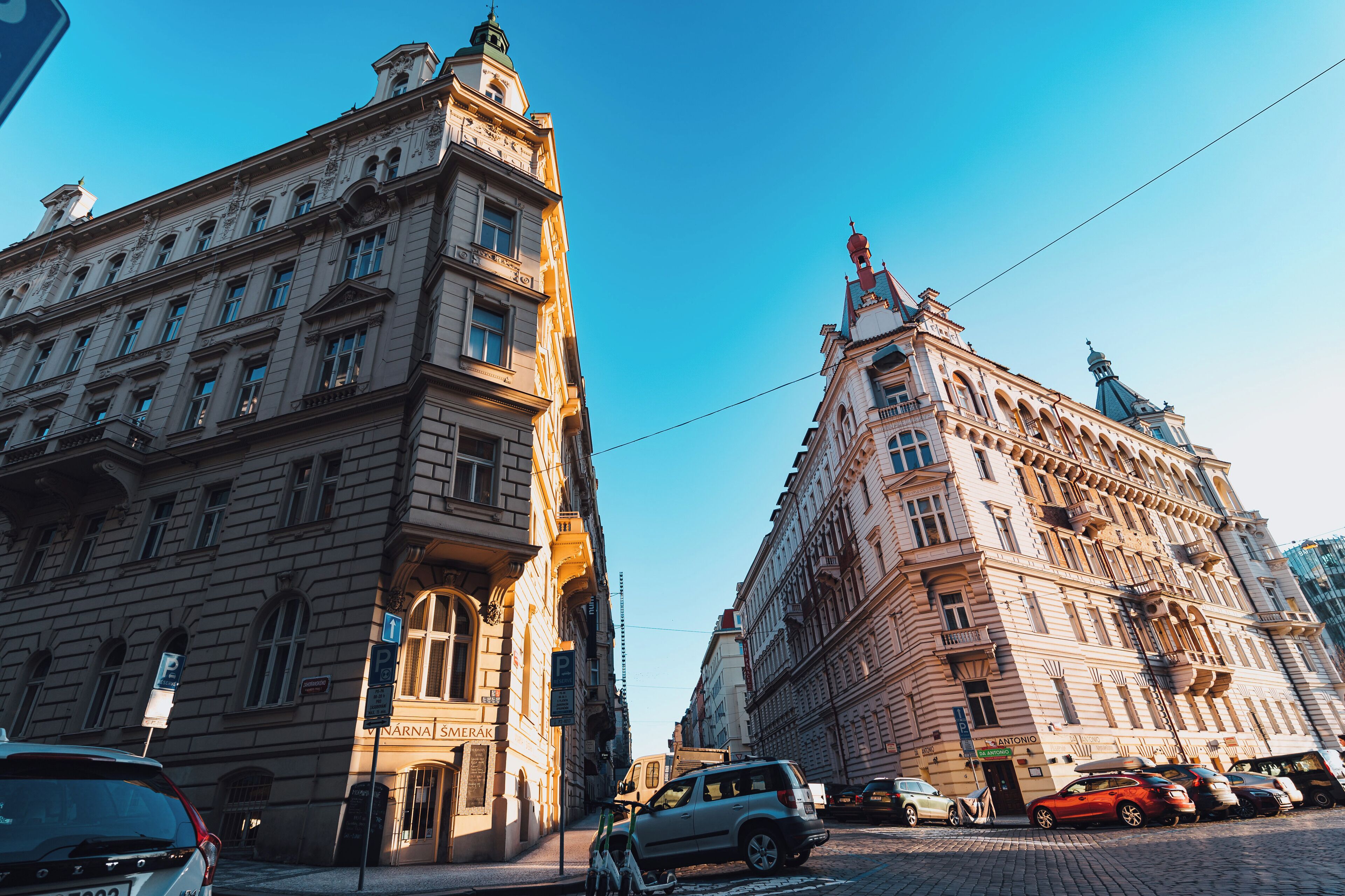A historic building with classical architecture, featuring ornate facades and multiple windows.