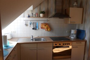 Stovetop, dishwasher, dining tables