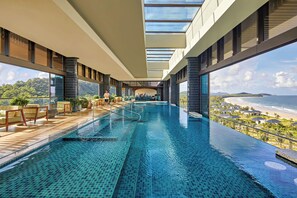 Indoor pool, outdoor pool, free pool cabanas, pool umbrellas