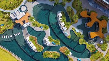 Indoor pool, outdoor pool, free pool cabanas, pool umbrellas