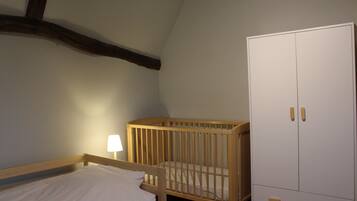 Family Room | 1 bedroom, blackout drapes, free WiFi, bed sheets