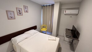 Standard Apartment, 1 Double Bed, Non Smoking | Desk, laptop workspace, blackout drapes, iron/ironing board - NORTH HOTEIS (Montes Claros)