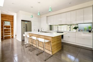 Fridge, microwave, oven, stovetop - Mount Coolum Beachfront Abode with Private Rooftop (Coolum Region)