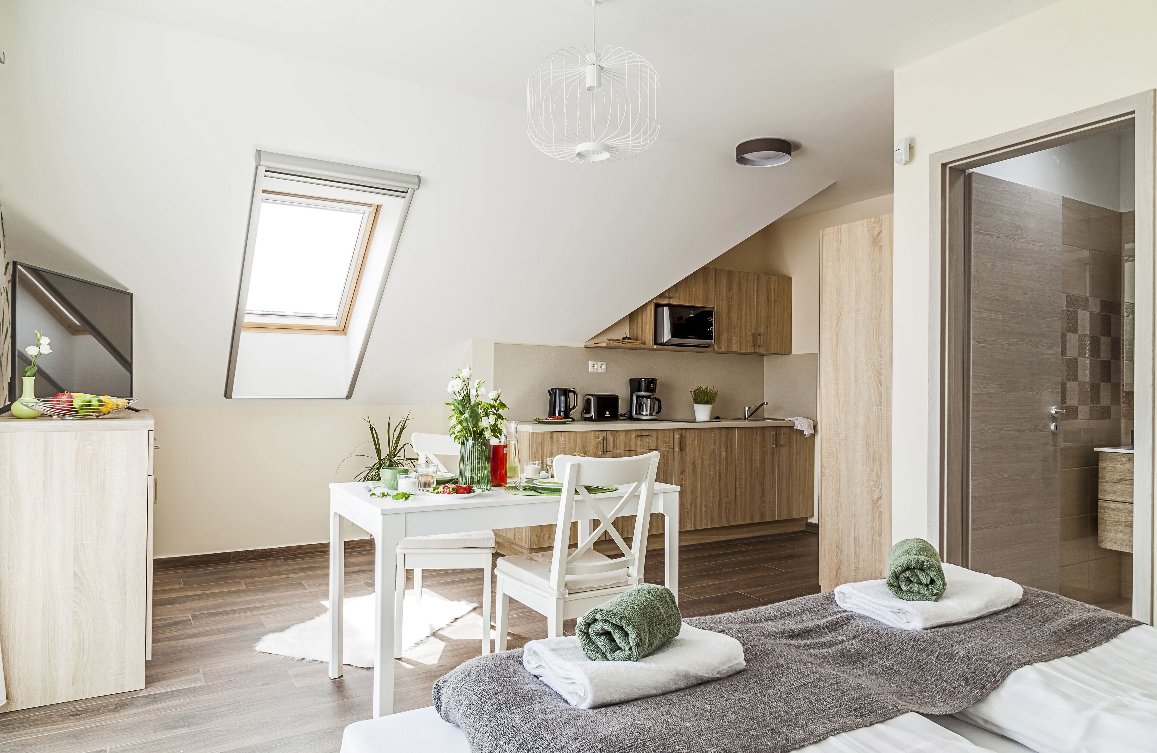 Panoramic Studio, Lake View | Living area | 81-cm Smart TV with digital channels