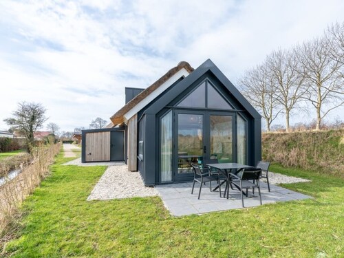 Welcome to Chalet 7 at Riethoek Westerschouwen, where peace, comfort and nature come together. Step