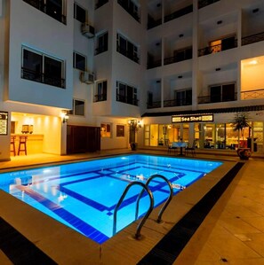 Outdoor pool, free cabanas, pool umbrellas