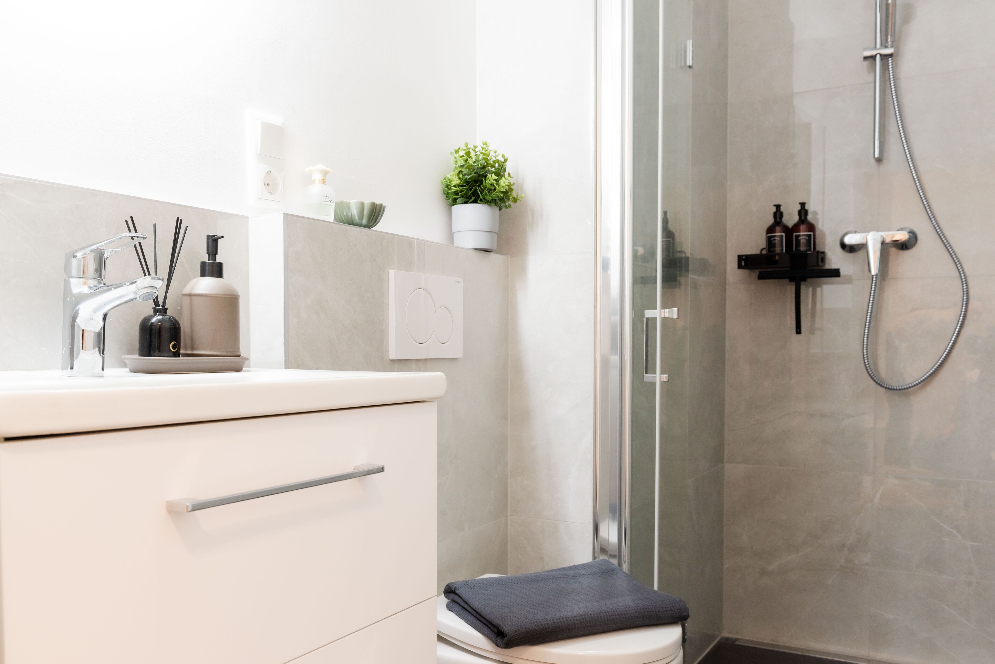 Hair dryer, towels, soap, shampoo