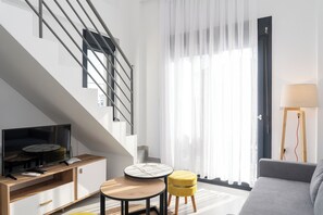 Loft, 2 Bedrooms, Pool Access | Living area | 40-inch Smart TV with cable channels - Erato Residential Complex (Ofrinion)
