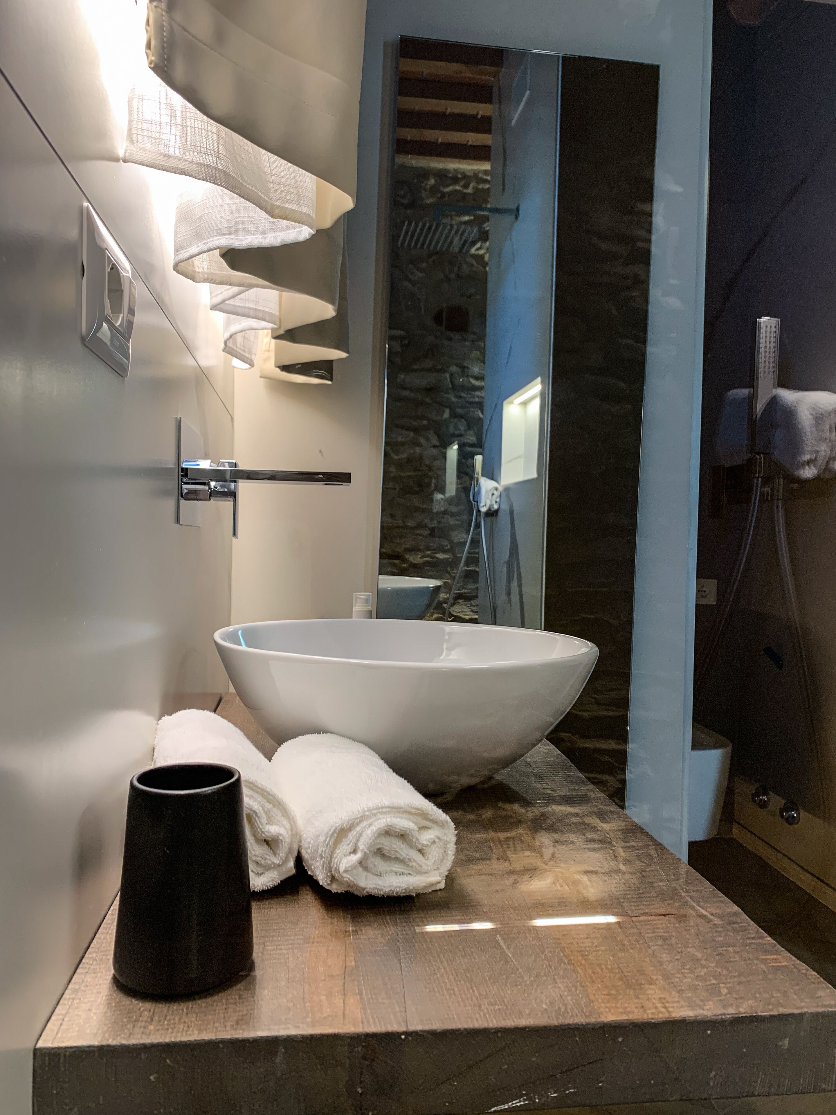 Shower, rainfall showerhead, designer toiletries, hair dryer