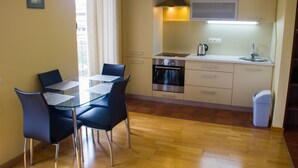 Full-size fridge, microwave, stovetop, electric kettle