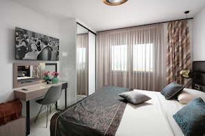 2 dormitorios, tabla de planchar con plancha, wifi y ropa de cama