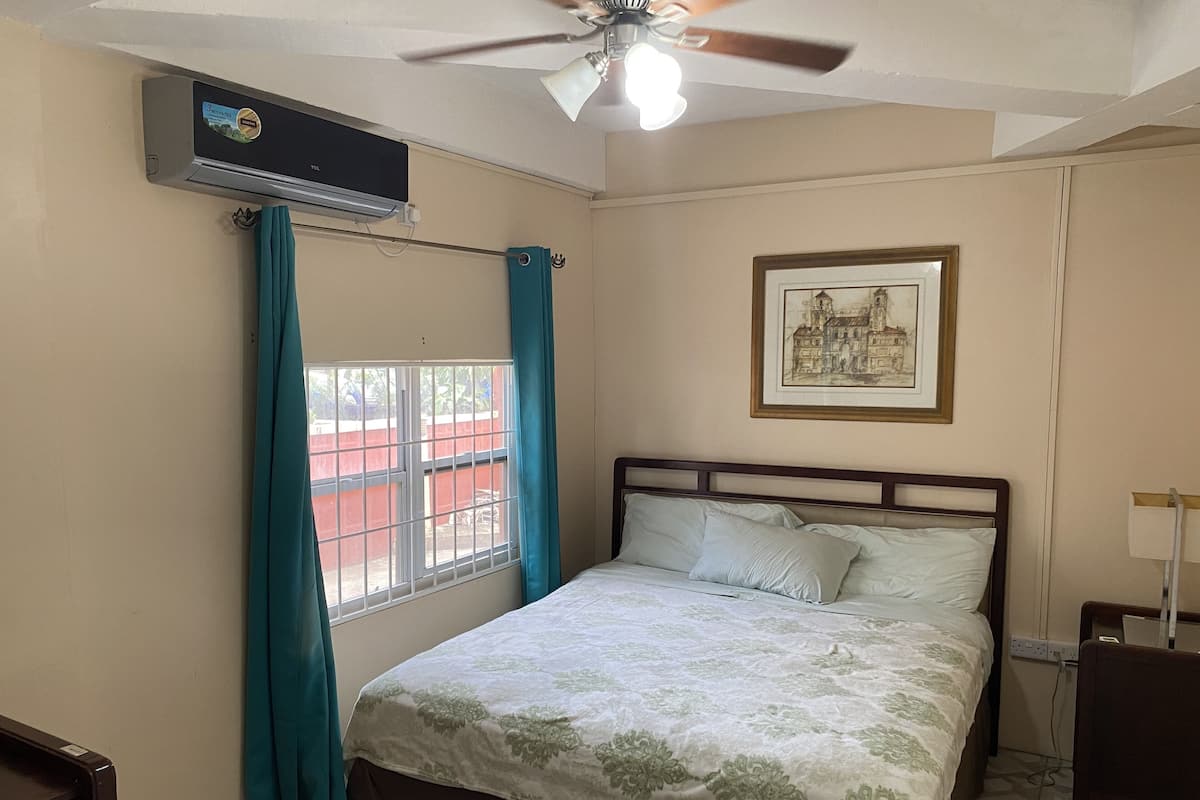 2 bedrooms, blackout curtains, iron/ironing board, free WiFi
