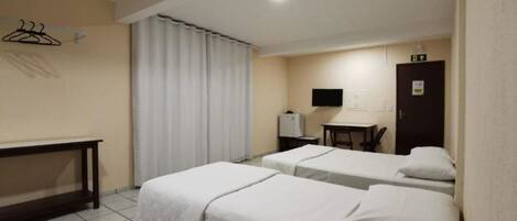 Deluxe Triple Room, Multiple Beds | Minibar, desk, free WiFi, bed sheets