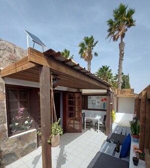 Outdoor dining - Private Sunny Terrace Studio Bungalow | Secure Bike or Board Lockup  (Tarajalillo)