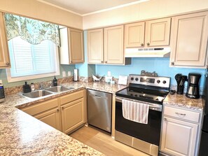 Fridge, microwave, oven, stovetop - Spacious 3-bedroom condo steps away from every thing in Ocean City! (Ocean City)
