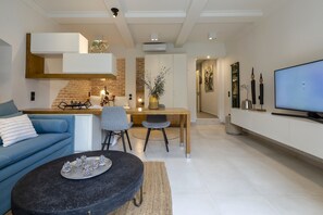 City Apartment | Living area | TV