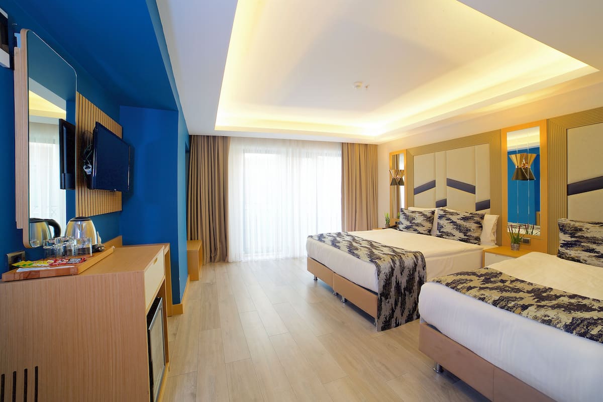 Chambre triple Standard | Minibar, système dâinsonorisation, accès au Wi-Fi (inclus)