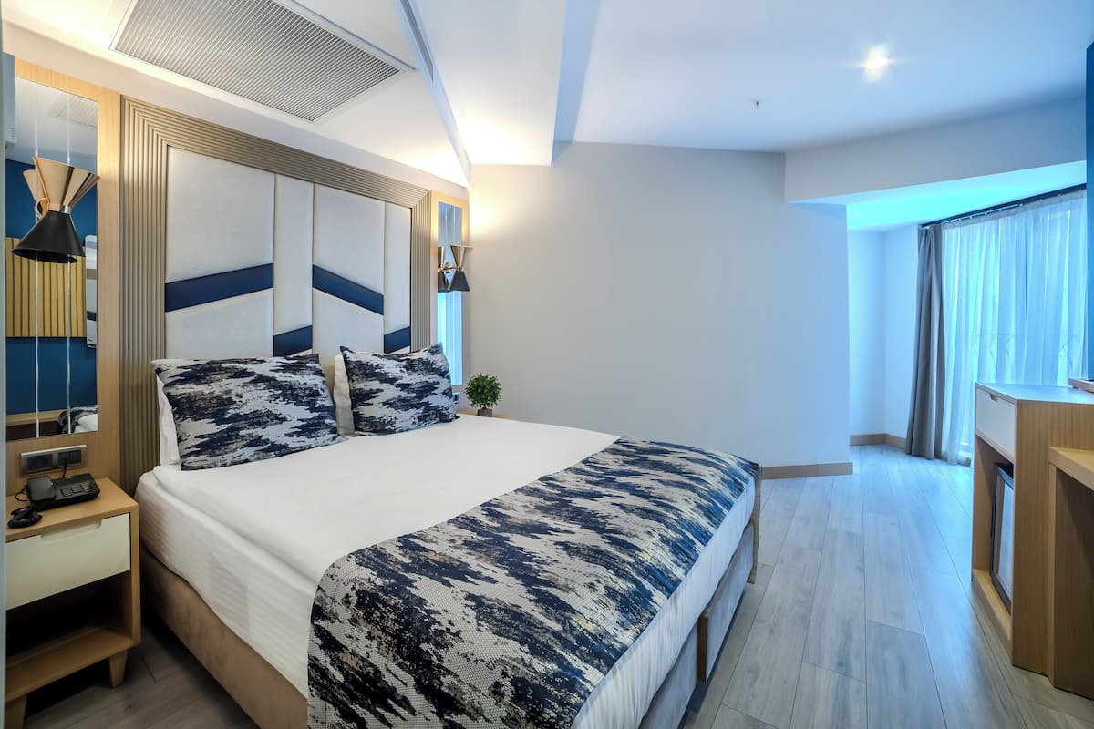 Chambre Standard double ou avec lits jumeaux | Minibar, système dâinsonorisation, accès au Wi-Fi (inclus)