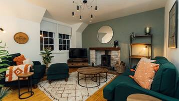 Smart TV, fireplace, books