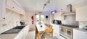 Fridge, microwave, oven, dishwasher - Amber Lodge - 3 bedroom bungalow with hot tub (Oakerthorpe)