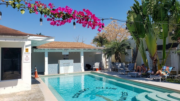 A private pool area with clear blue water, lounge chairs, and a covered seating area. - ATTENTION: Frequent Island wide power outages likely! Summer/Fall 2026. (Nassau)