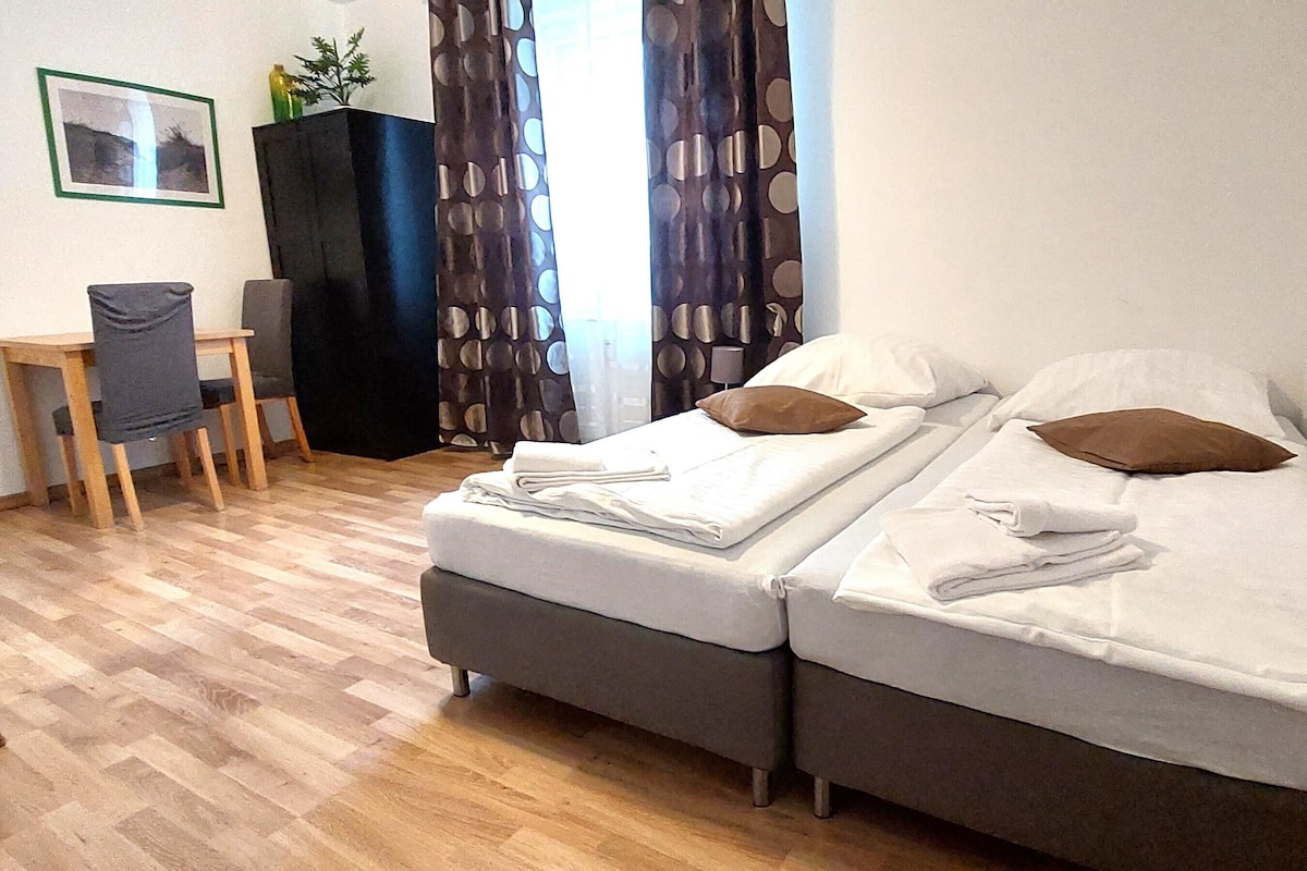 City Double Room, Non Smoking | Living area | Flat-screen TV