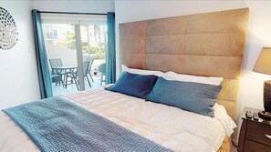 1 bedroom, desk, iron/ironing board, travel crib