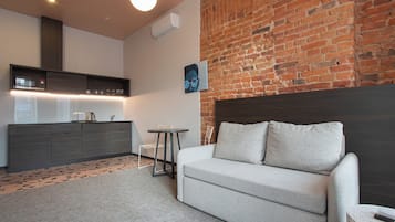 City Apartment | Living area | 45-inch TV with cable channels