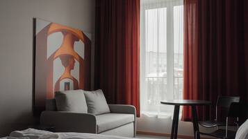 Blackout drapes, iron/ironing board, free WiFi, bed sheets